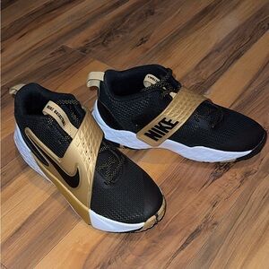 Nike Black and Gold Slip-On Sneakers